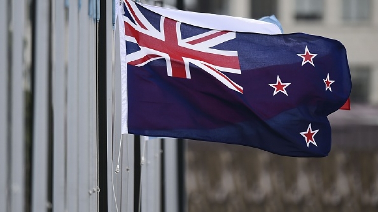 The New Zealand flag flutters outside Parliament buildings in Wellington in Wellington on October 29, 2014.  New Zealand will hold a binding referendum in 2016 on changing the national flag, with Prime Minister John Key hoping to drop the current design featuring Britain's Union Jack in favour of a silver fern.   AFP PHOTO / MARTY MELVILLE        (Photo credit should read Marty Melville/AFP/Getty Images)